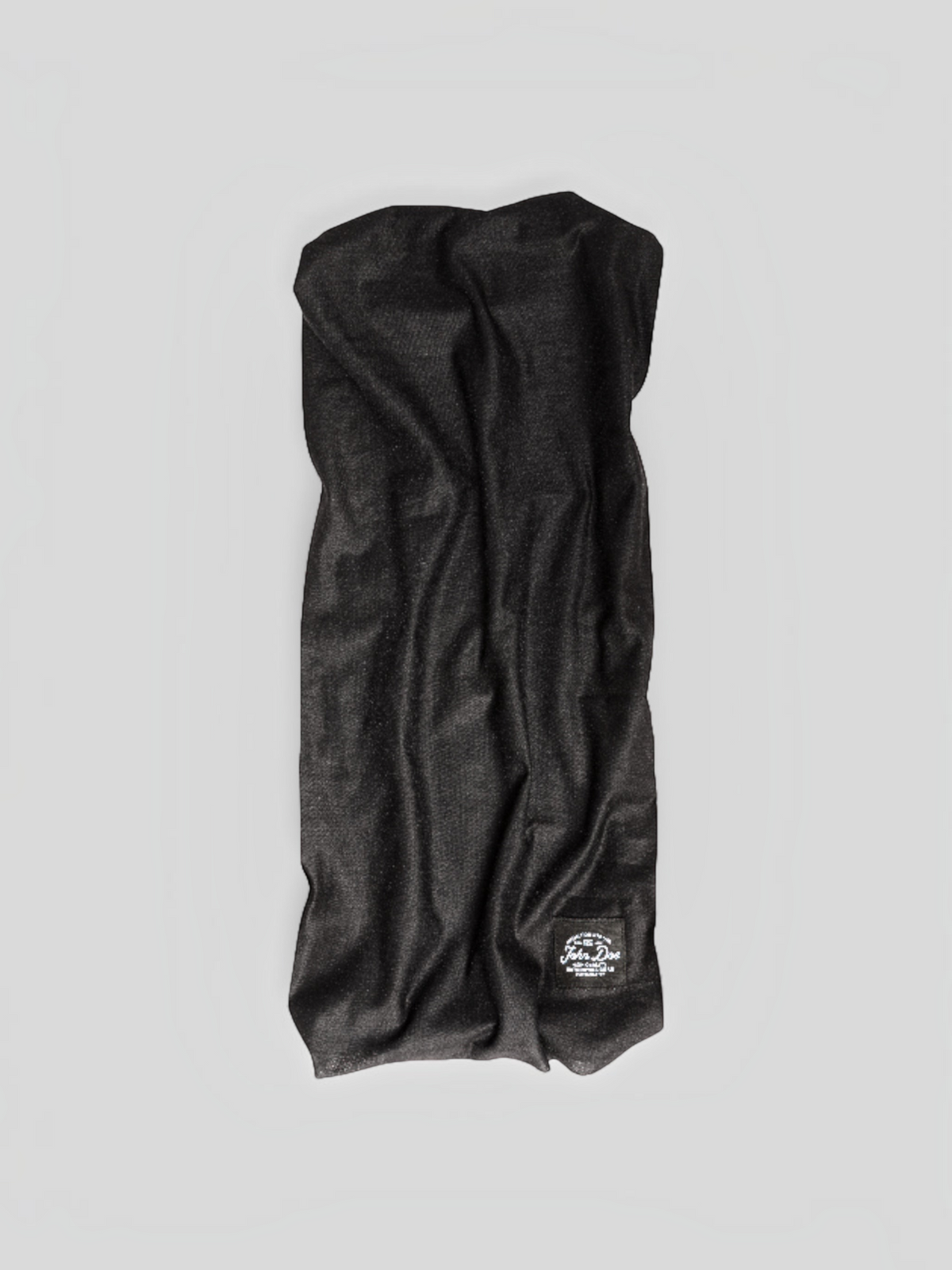 Baffle Haus black seamless microfiber neck tube with John Doe branding for sports and outdoor protection