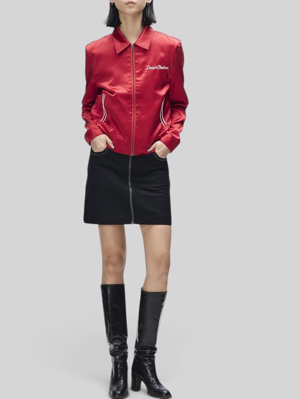 Baffle Haus Outlaw Zip Mini Skirt in black moleskin with front zip and studded pocket detail worn by a model.