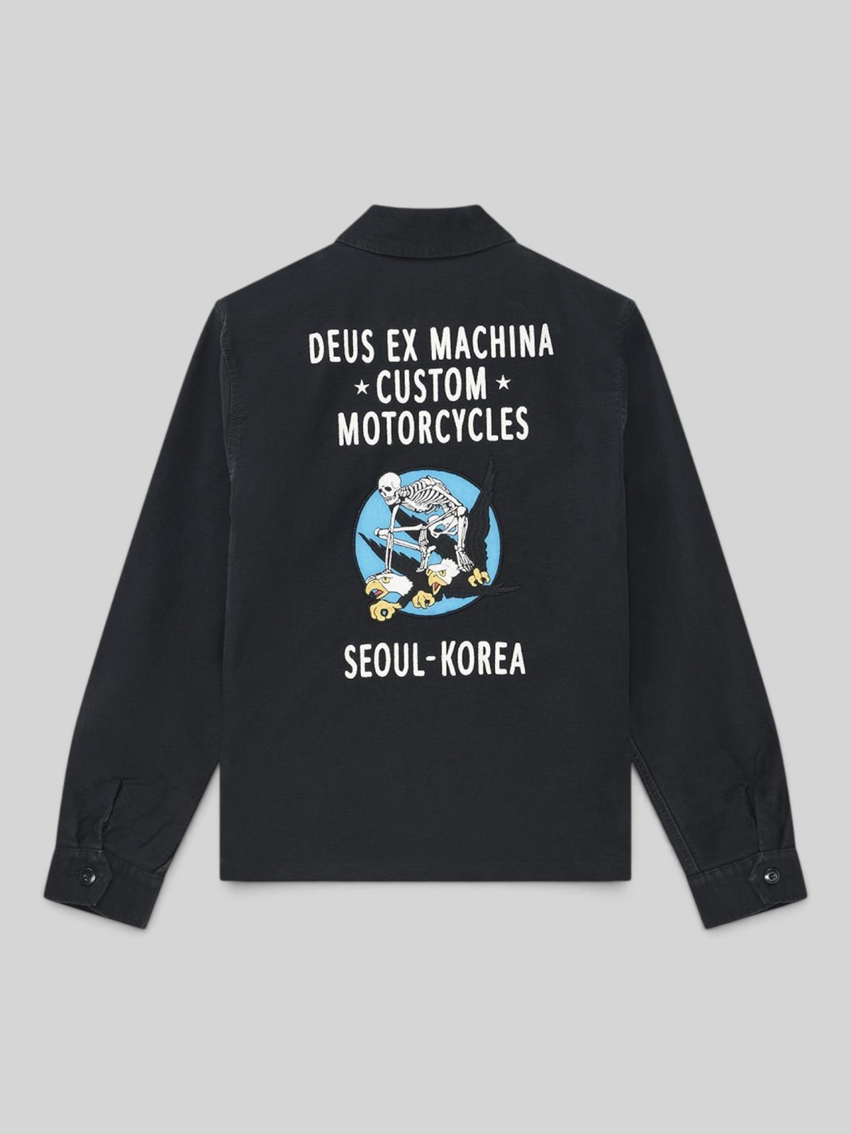 Baffle Haus black organic cotton sateen souvenir jacket with back embroidery of a skeleton riding an eagle