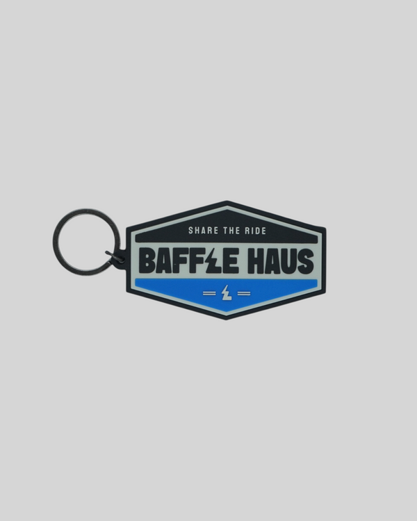 Baffle Haus blue retro key tag made of durable embossed PVC with a debossed logo and black split-ring keyring.