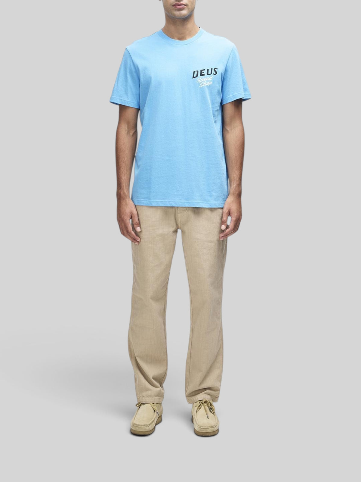 Baffle Haus Dogleg Tee in Bonnie Blue with Deus Speed Shop chest print, made from recycled and organic cotton jersey.