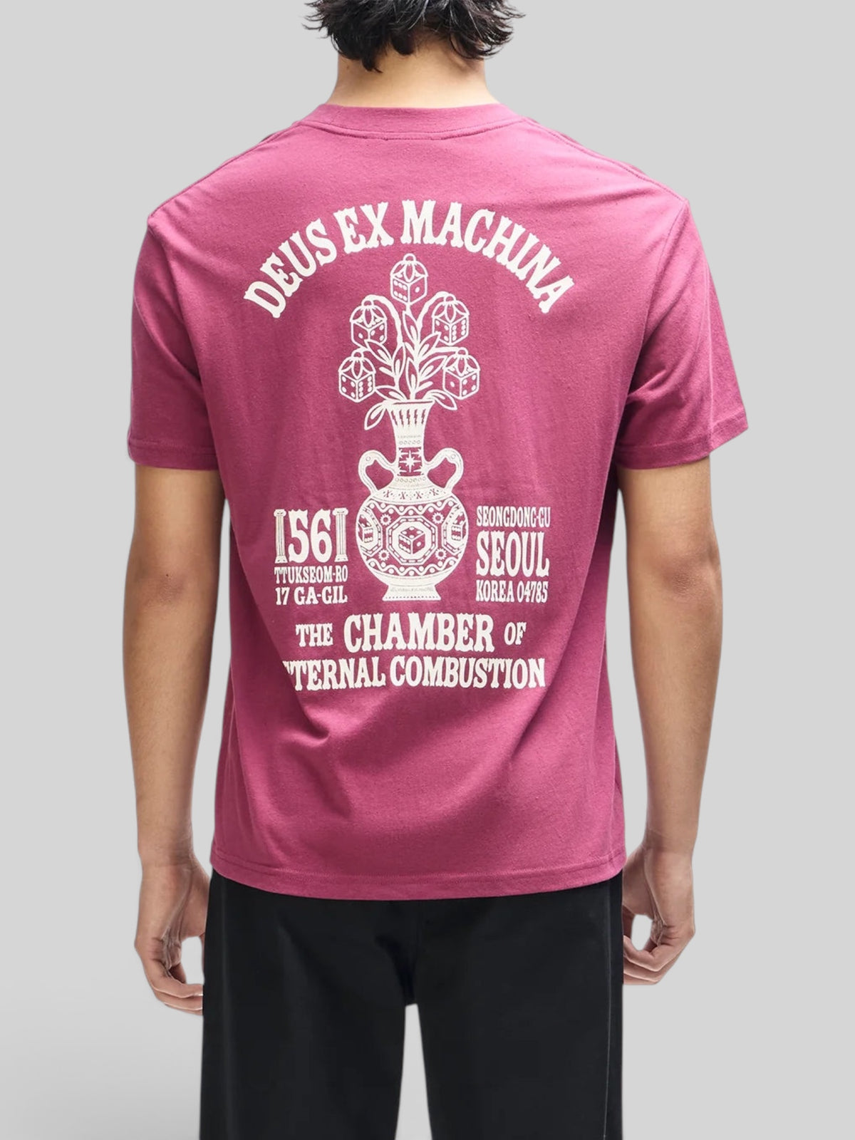 Baffle Haus burgundy box fit tee with white graphic print of a vase and text on the back, made from recycled cotton.