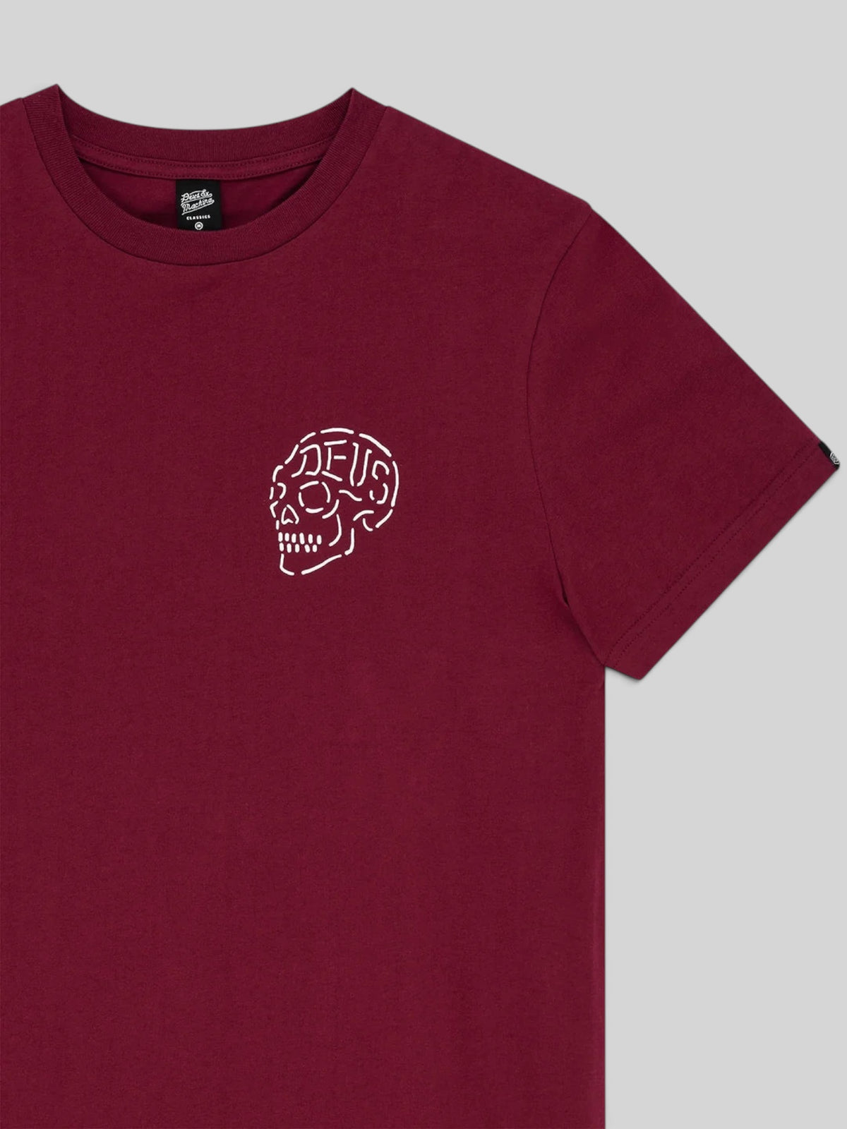 Baffle Haus Venice Skull Tee in burgundy organic cotton with a white graphic print on the chest