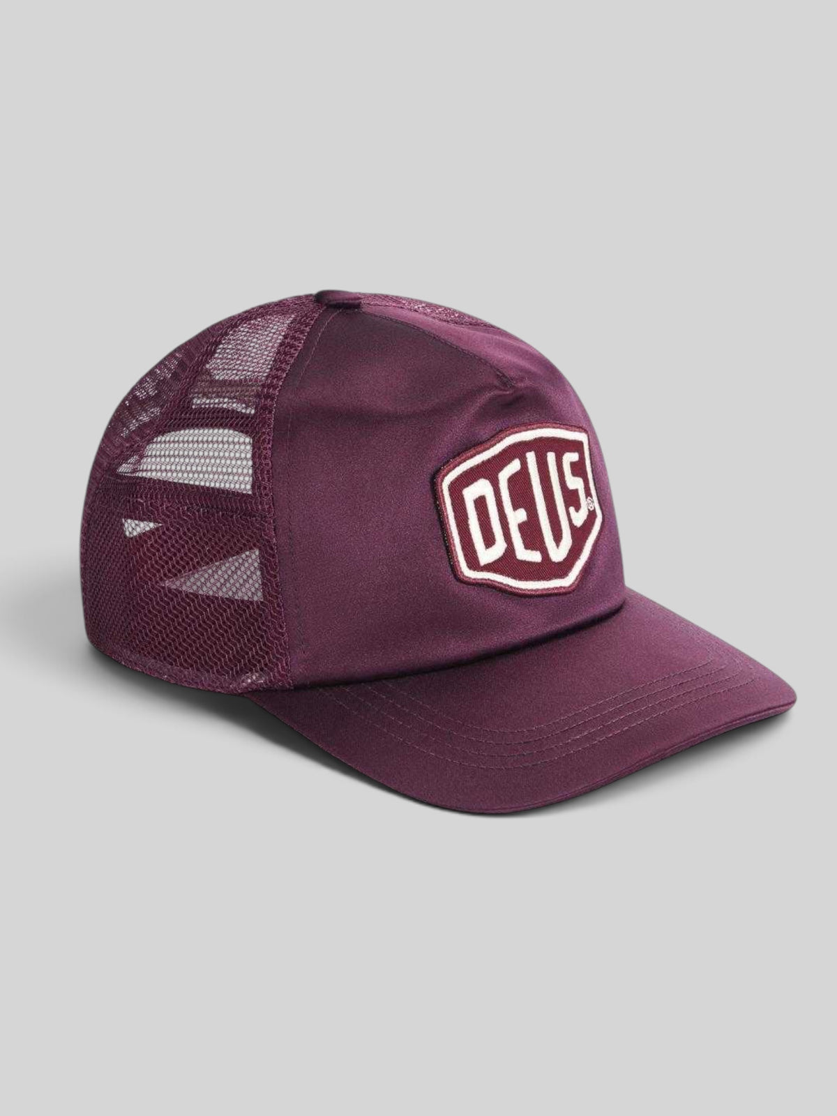 Baffle Haus Paris Shield trucker cap in cabernet red satin and mesh with a front logo patch and snapback closure.