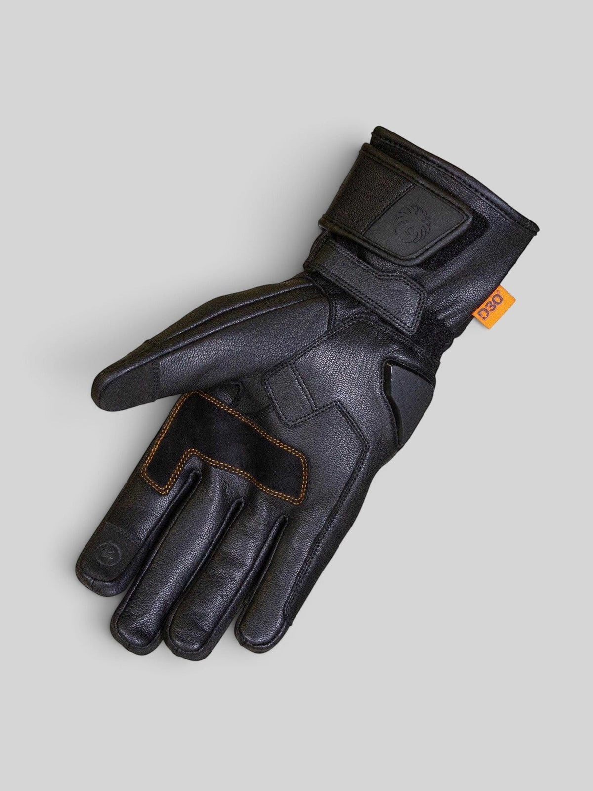 Baffle Haus Calton black leather motorcycle glove with D3O protection, Velcro cuff, and reinforced palm overlay.