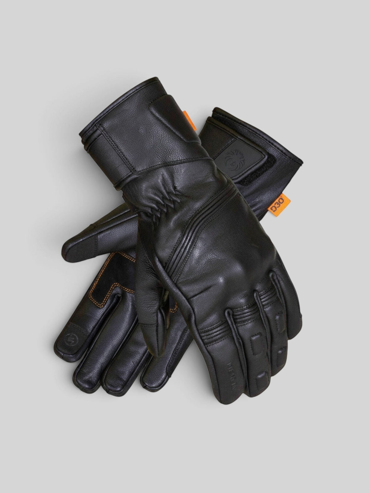 Baffle Haus Calton black leather motorcycle gloves with D3O protection, waterproof membrane, and Velcro wrist closure.