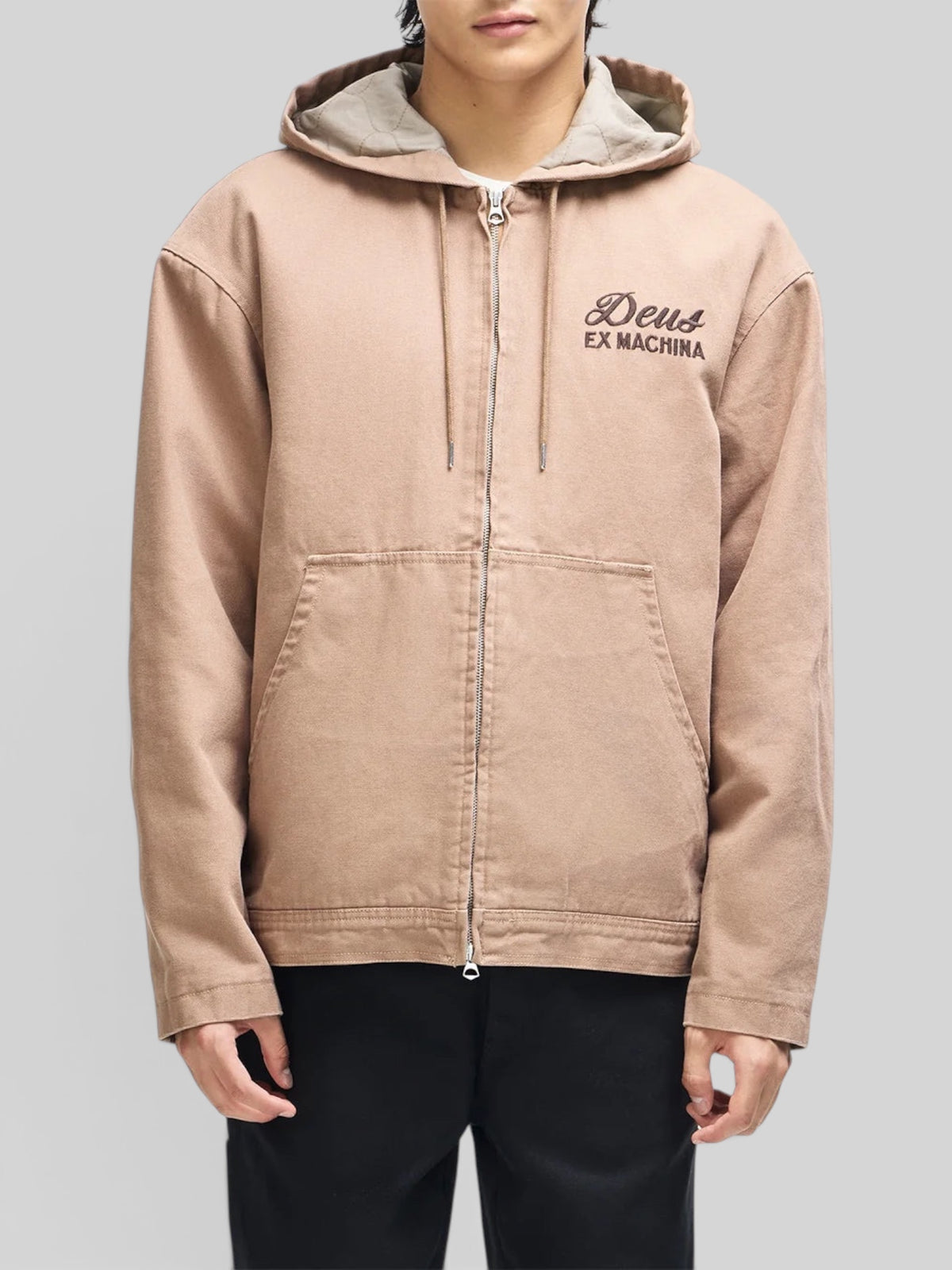 Baffle Haus camel brown cotton canvas hooded work jacket with zip front and Deus Ex Machina chest embroidery