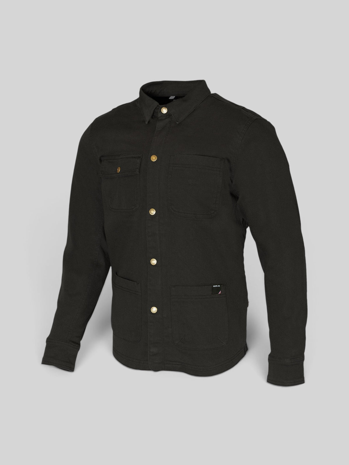 Baffle Haus Carter black long-sleeve shirt with gold buttons and four front pockets on a light grey background.