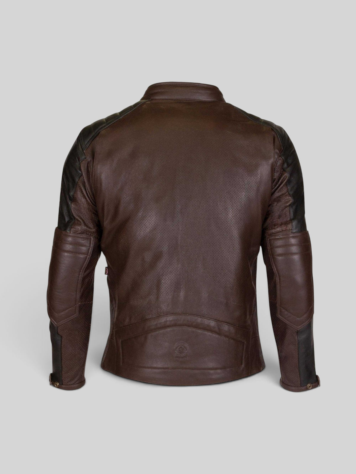 Back view of Baffle Haus Chase D30 brown and black perforated cowhide leather motorcycle jacket with padded details.
