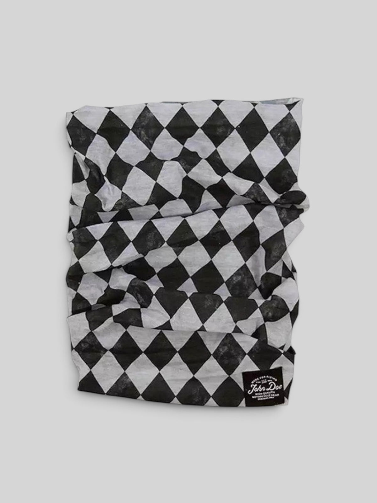 Baffle Haus neck tube featuring a black and white checkered race flag pattern in breathable technical microfibre.