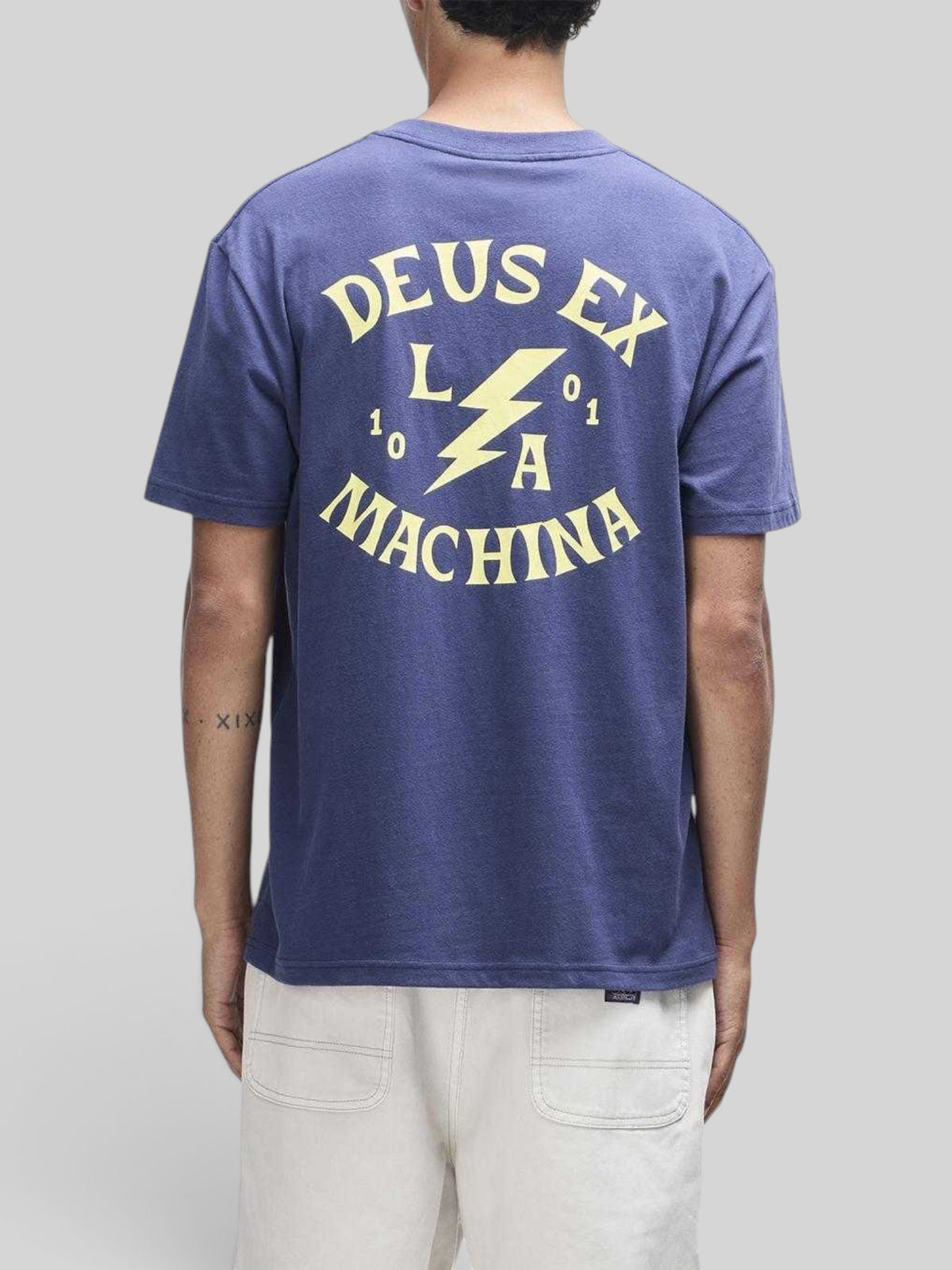 Baffle Haus Chinook Tee in mechanic blue with yellow Deus Ex Machina graphic print on the back, box fit style.