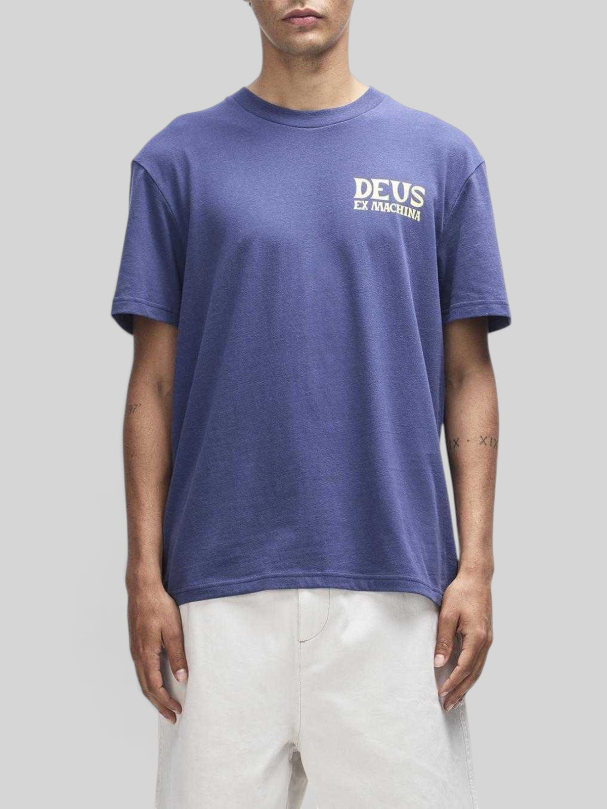 Baffle Haus Chinook Tee in mechanic blue with Deus Ex Machina chest logo, made from recycled cotton and polyester.