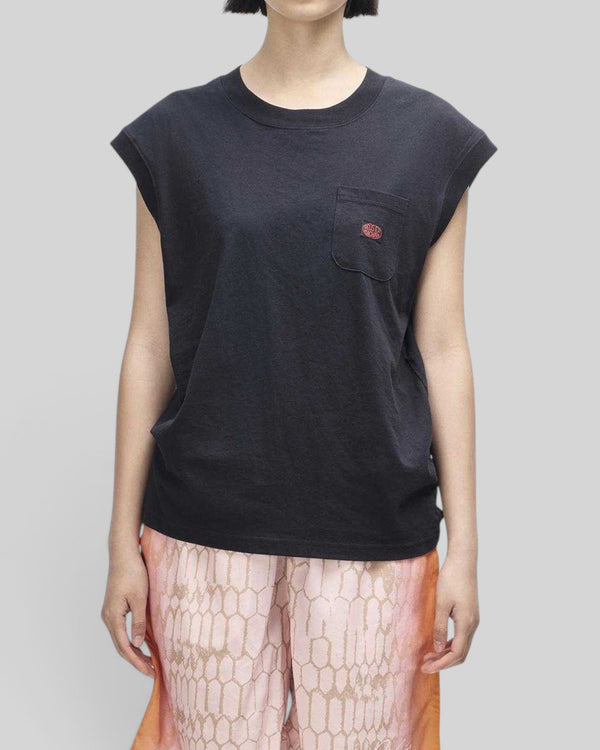 Baffle Haus Christine black cap sleeve tank top with a chest pocket and ribbed neckline on a model