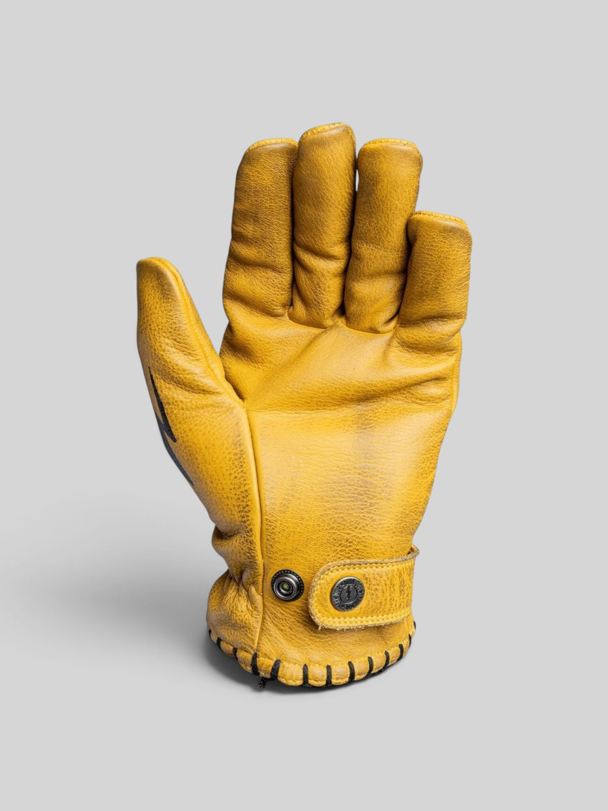 Baffle Haus Coyote yellow cowhide leather motorcycle gloves with adjustable wrist strap and stitched cuff detail