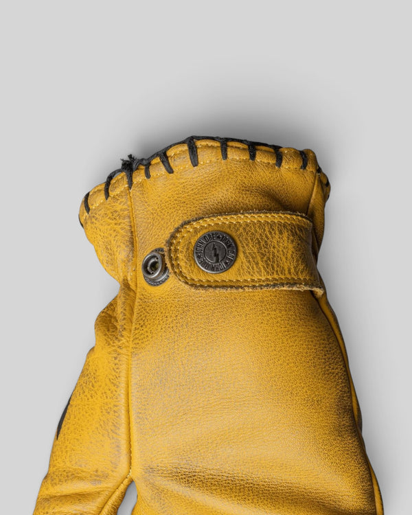 Baffle Haus John Doe Coyote yellow cowhide leather motorcycle gloves with adjustable wrist strap and stitched cuff