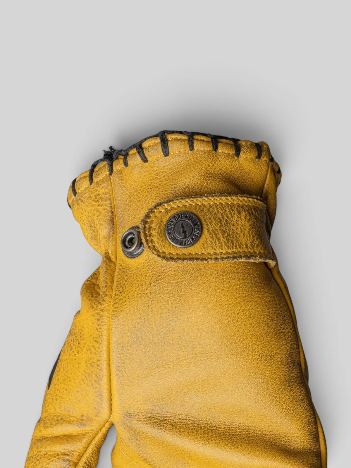 Baffle Haus John Doe Coyote yellow cowhide leather motorcycle gloves with adjustable wrist strap and stitched cuff