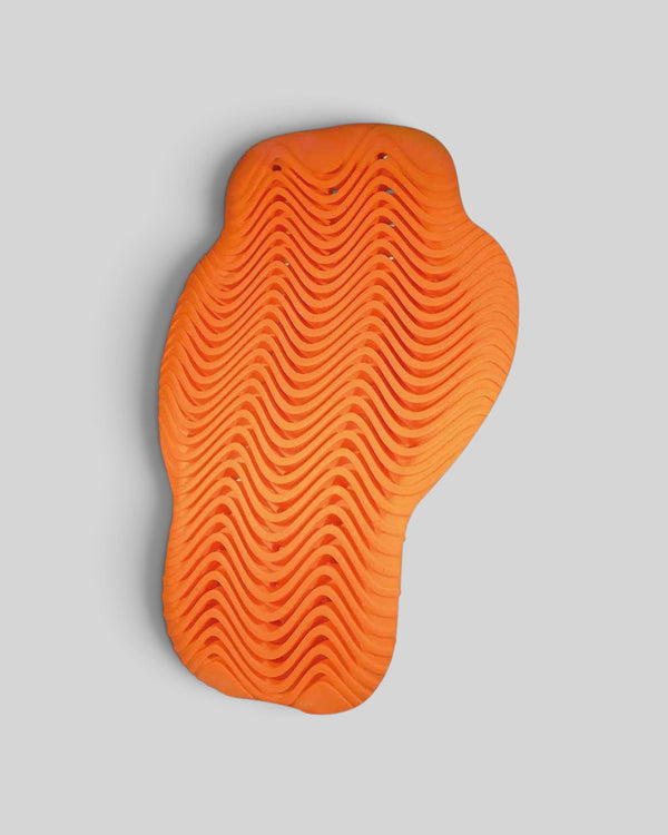 Baffle Haus orange D3O Viper back protector featuring an ergonomic, wave-patterned airwave construction for breathability.
