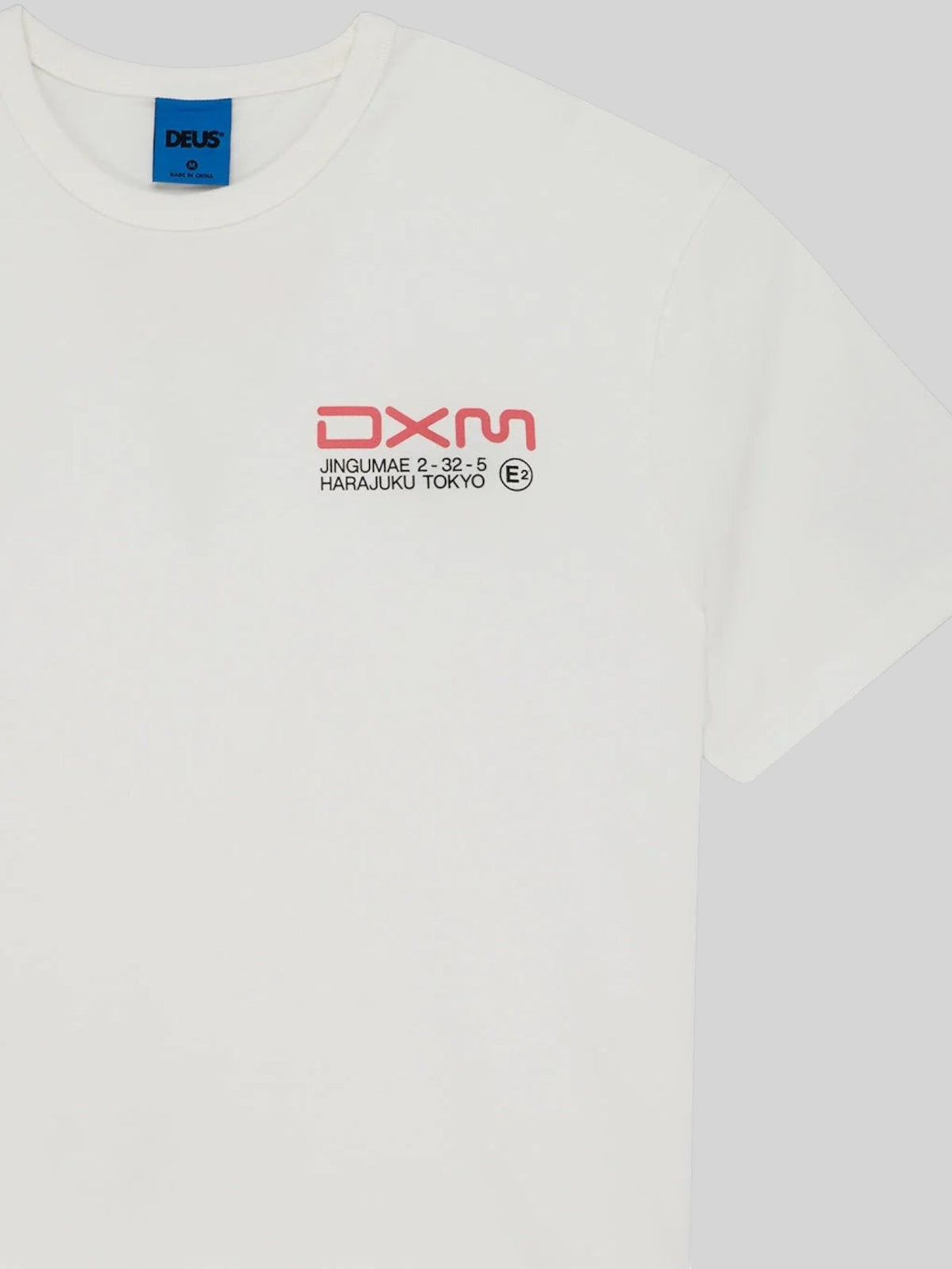 Baffle Haus Departed Tee in vintage white cotton blend jersey with red DXM chest graphic print