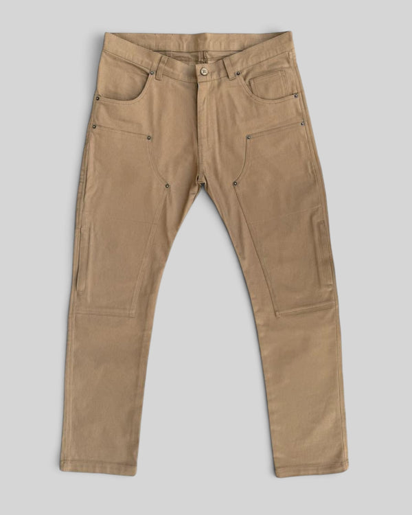 Baffle Haus Service Pants in desert khaki with a vintage carpenter workwear style and reinforced knee panels.