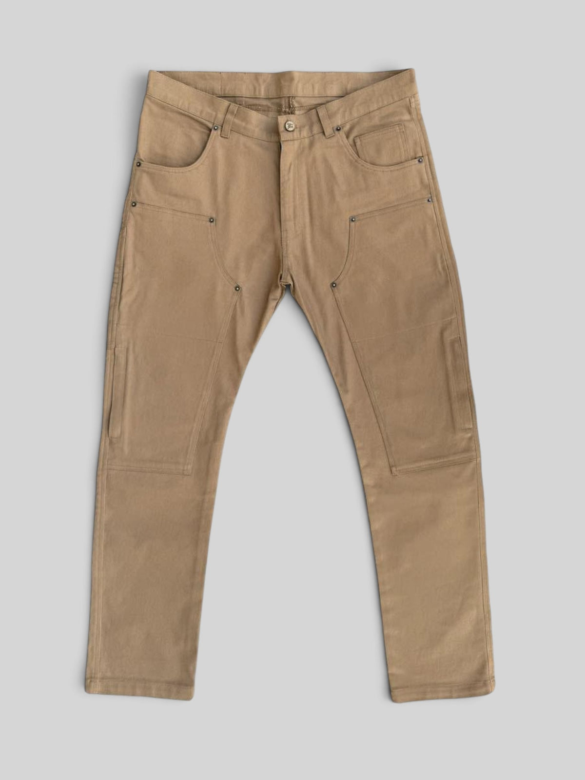 Baffle Haus Service Pants in desert khaki with a vintage carpenter workwear style and reinforced knee panels.