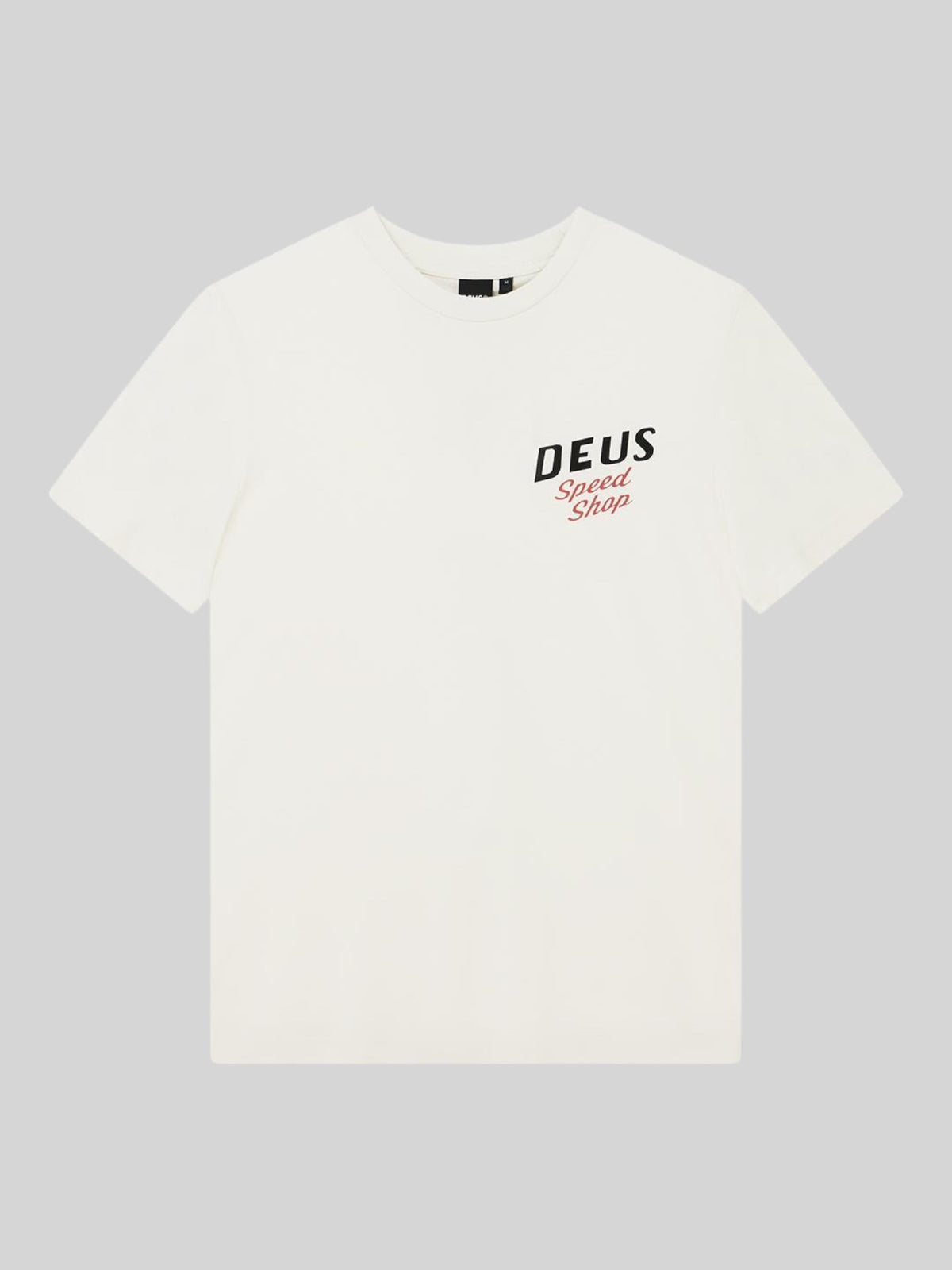 Baffle Haus Dogleg Tee in dirty white featuring a Deus Speed Shop chest graphic on organic cotton jersey fabric.