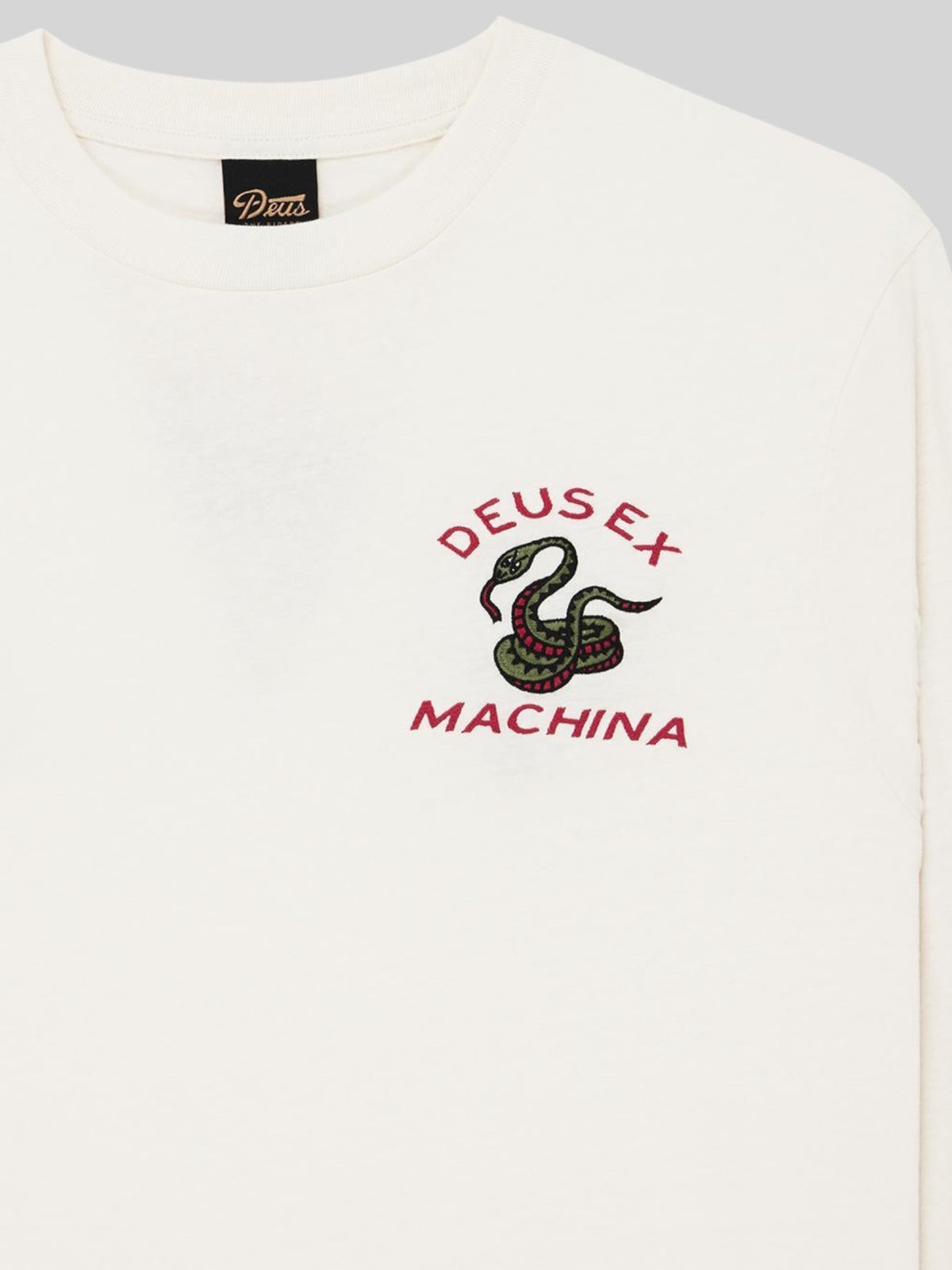 Baffle Haus long sleeve tee in dirty white with embroidered snake graphic and Deus Ex Machina chest logo