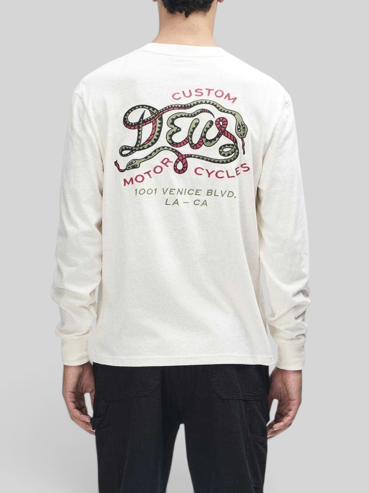 Baffle Haus Danger Noodle long sleeve tee in dirty white with graphic snake and Deus logo print on the back