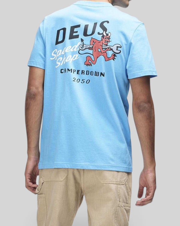 Baffle Haus Dogleg Tee in bonnie blue featuring a graphic print of a devil with a wrench on the back