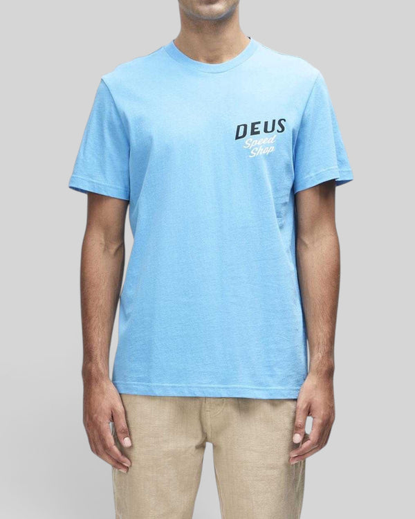 Baffle Haus Dogleg Tee in Bonnie Blue featuring a Deus Speed Shop chest print on recycled and organic cotton jersey.