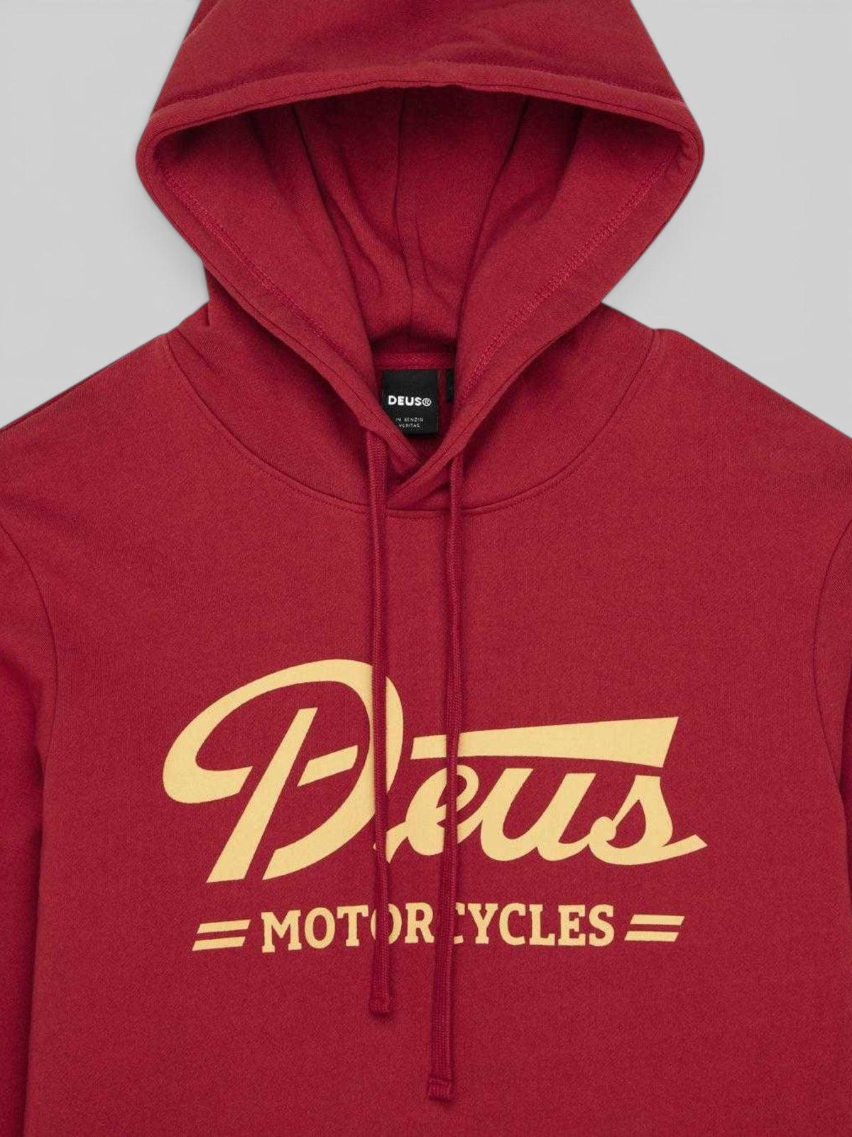 Baffle Haus Downshift Hoodie in Lava Falls red organic cotton fleece with vintage-style gold chest graphic print