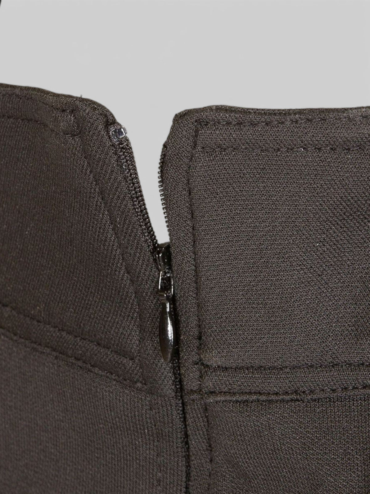 Close up of the YKK fly zipper on Baffle Haus Elana D30 black Kevlar motorcycle leggings