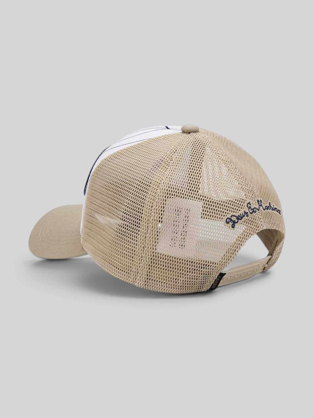 Baffle Haus Forecourt Trucker cap in safari beige with mesh back, pinstripe detail, and snapback closure.