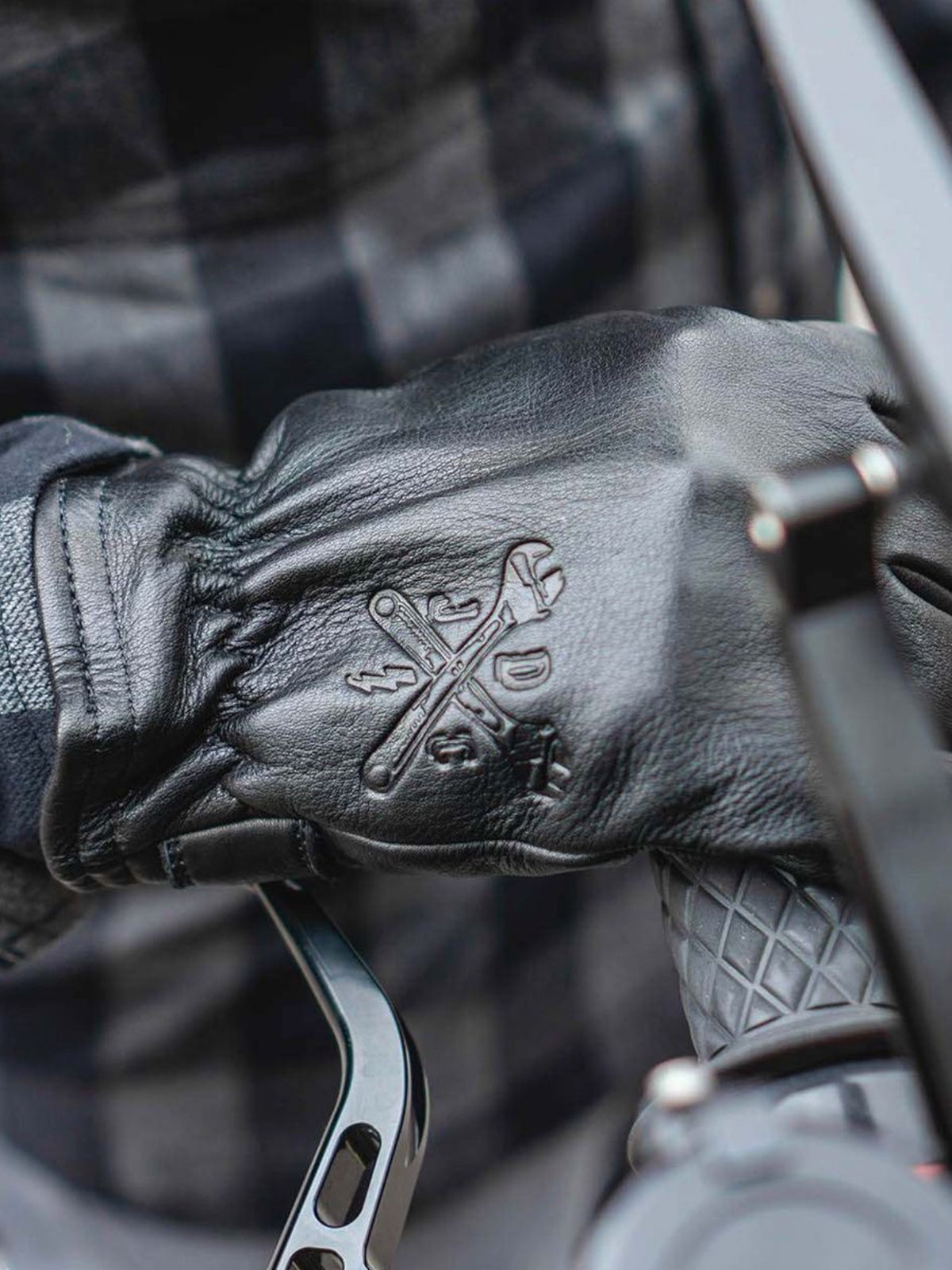 Baffle Haus Freewheeler XTM black cowhide leather motorcycle gloves with embossed logo on the wrist