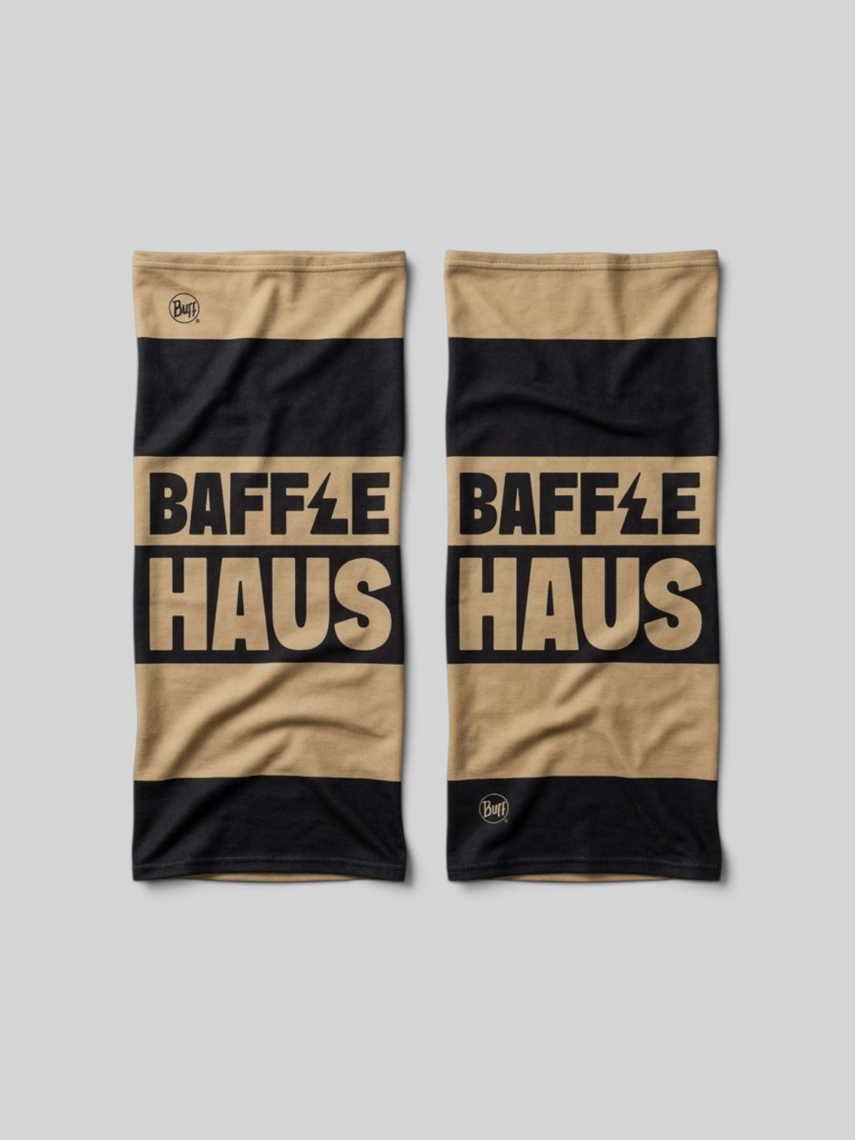 Baffle Haus x Buff neck tube in gold and black stripes with Baffle Haus branding on recycled EcoStretch fabric