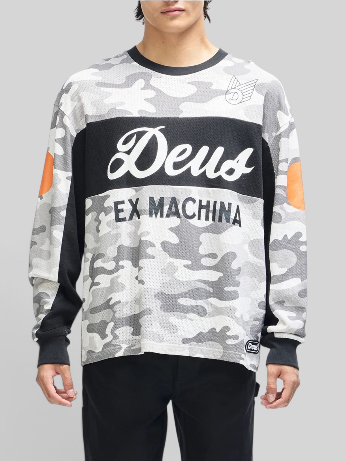 Baffle Haus grey camo moto jersey with graphic chest prints, loose fit, and orange sleeve details on a male model.