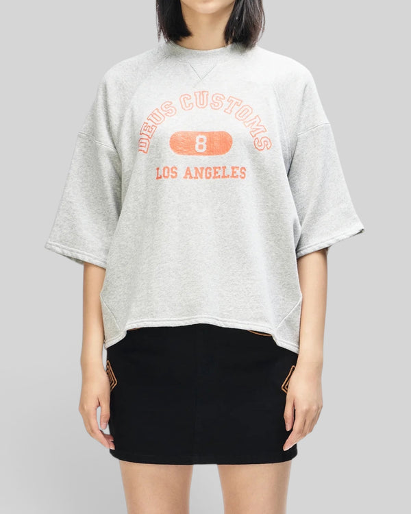 Baffle Haus La Eight Crew in grey marle organic cotton fleece with 3/4 sleeves and orange front crackle print