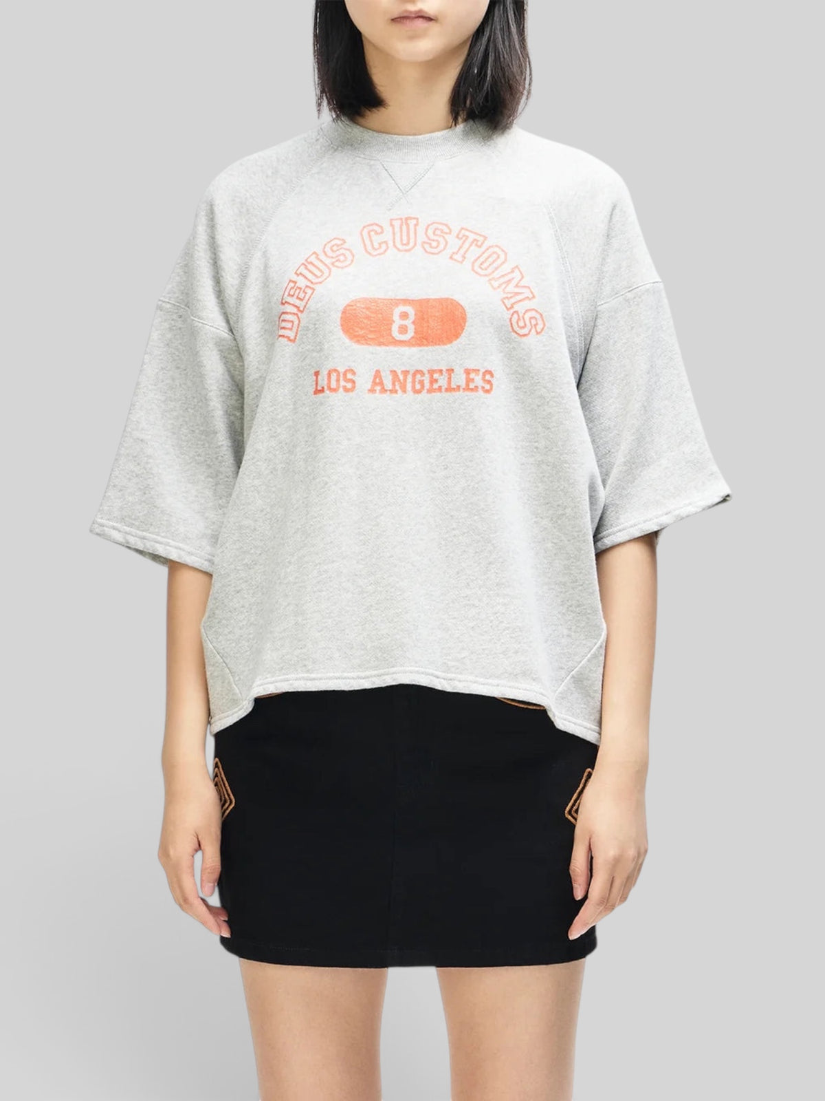 Baffle Haus La Eight Crew in grey marle organic cotton fleece with 3/4 sleeves and orange front crackle print