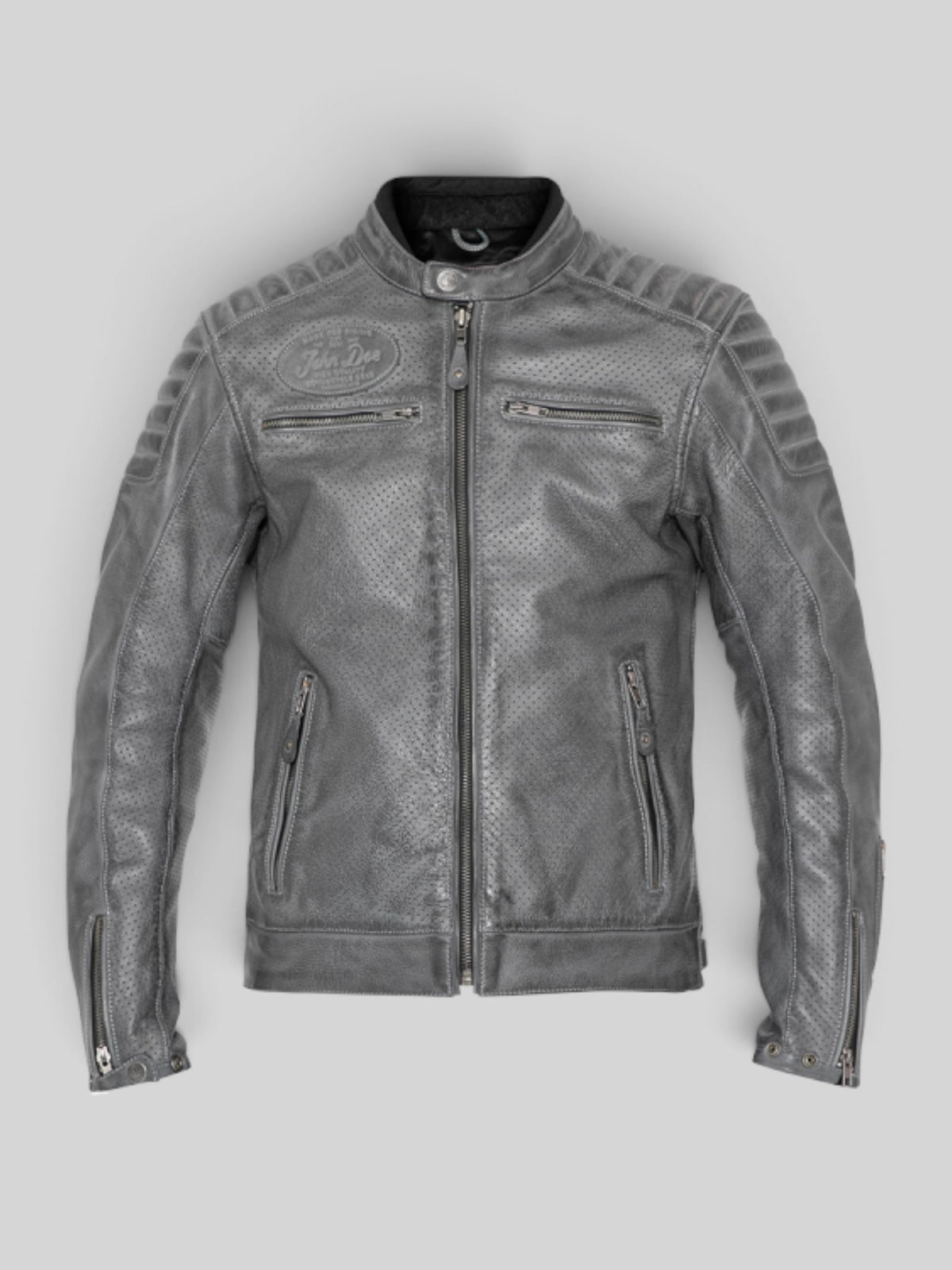 Baffle Haus grey perforated leather motorcycle jacket with padded shoulders, zippered pockets, and a button collar.