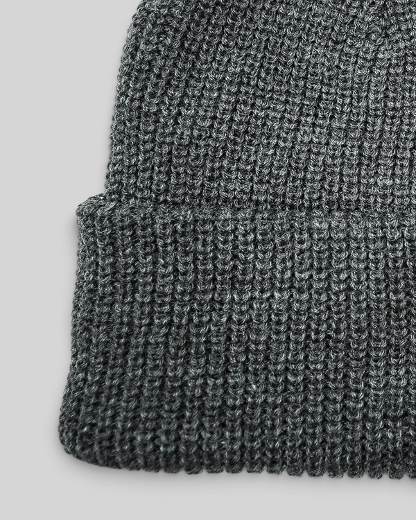 Baffle Haus grey ribbed acrylic beanie with a classic cuffed design for everyday warmth and comfort.