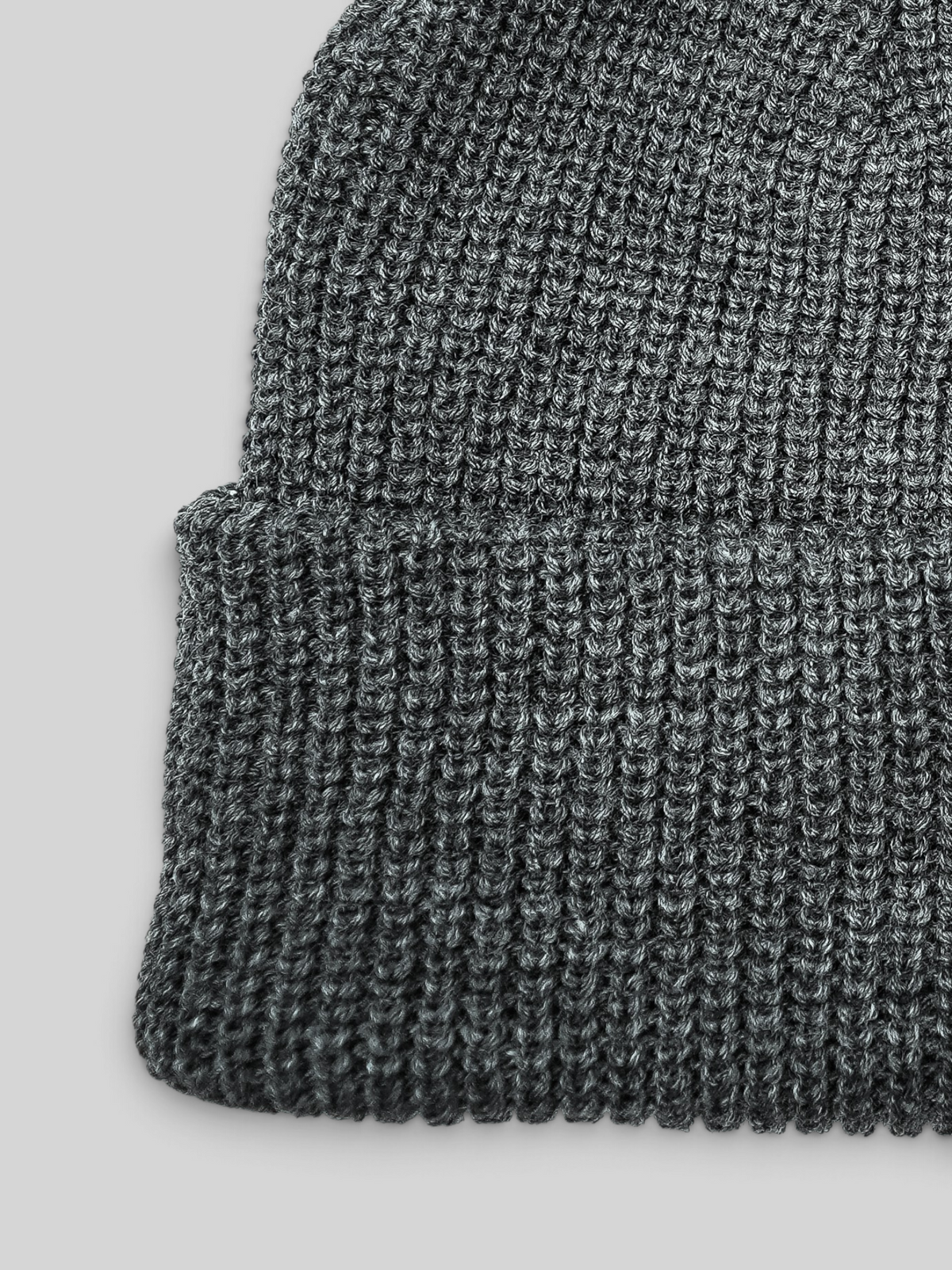 Baffle Haus grey ribbed acrylic beanie with a classic cuffed design for everyday warmth and comfort.