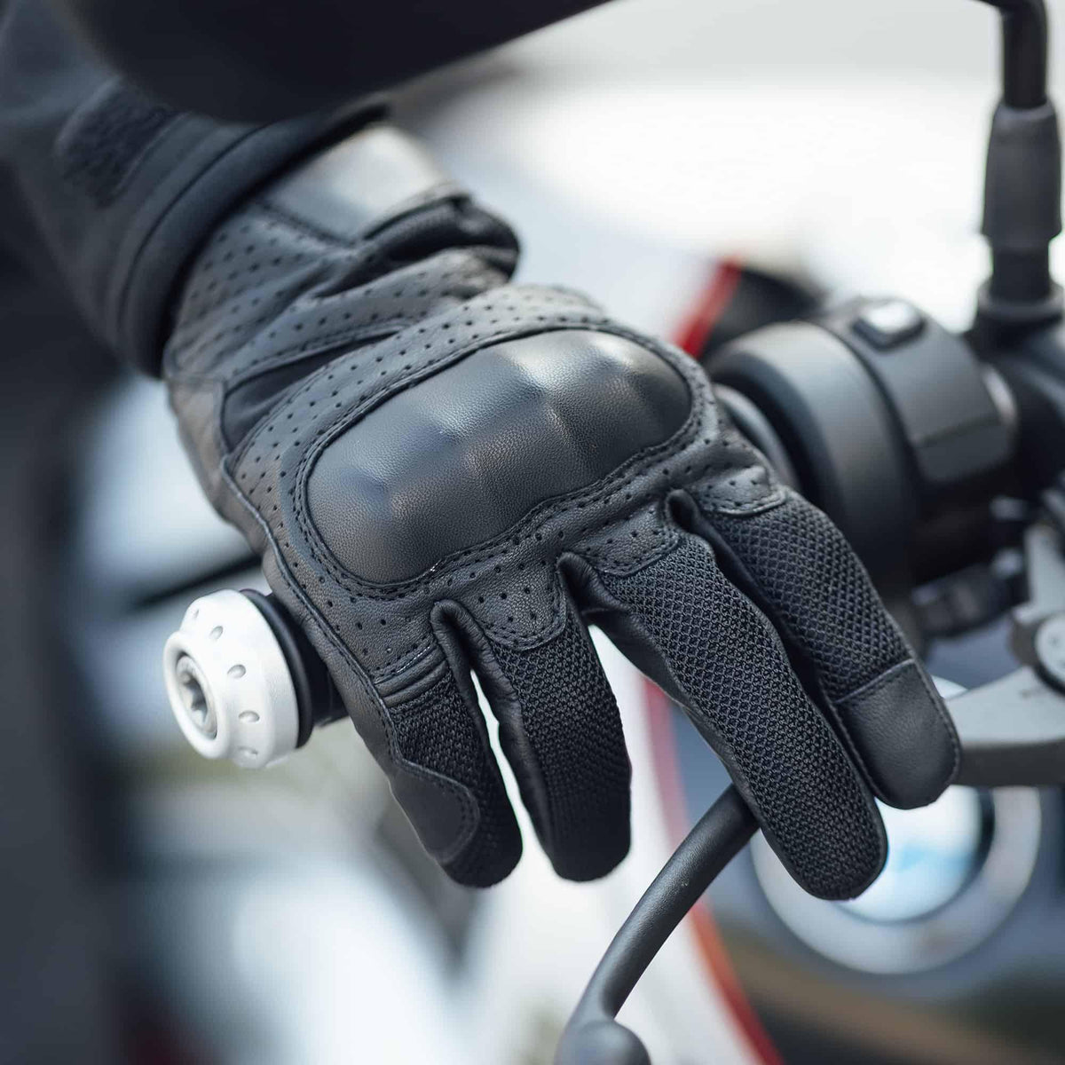 Baffle Haus Griffin Urban D3O motorcycle glove in black perforated leather and mesh with knuckle protection