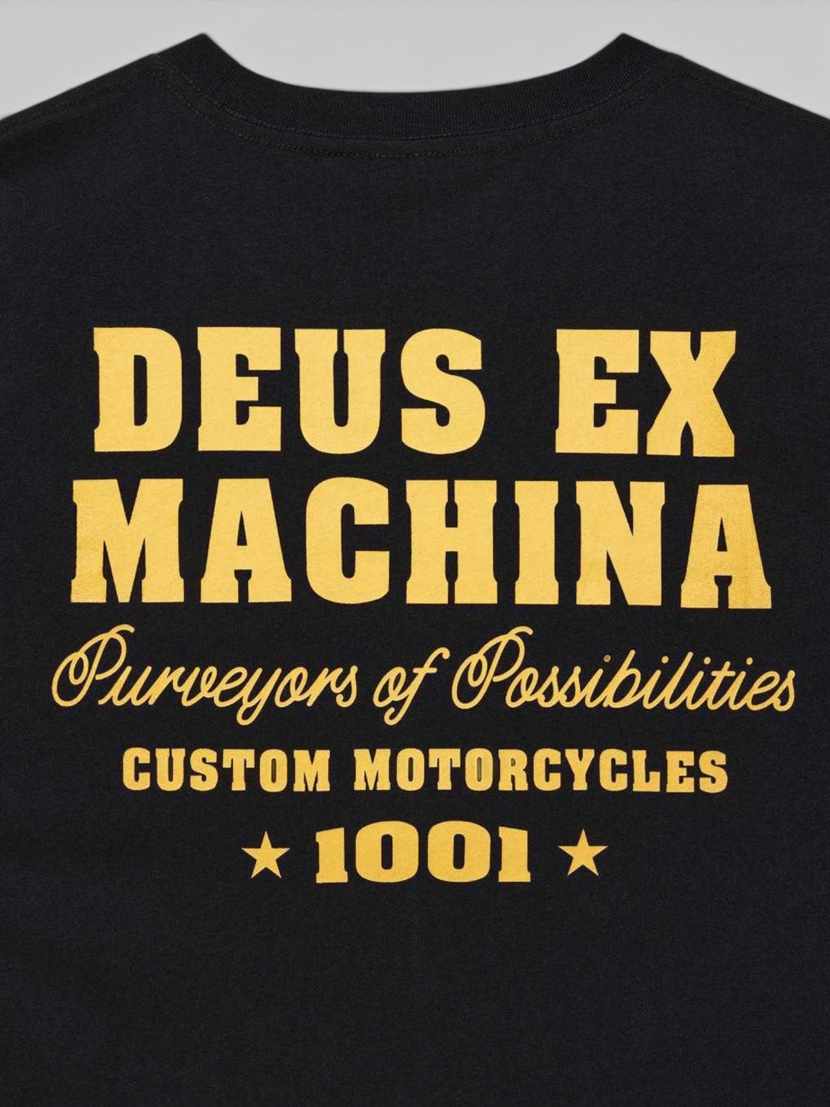 Baffle Haus Gumshoe Tee in black organic cotton featuring yellow vintage-style motorcycle graphic print on the back