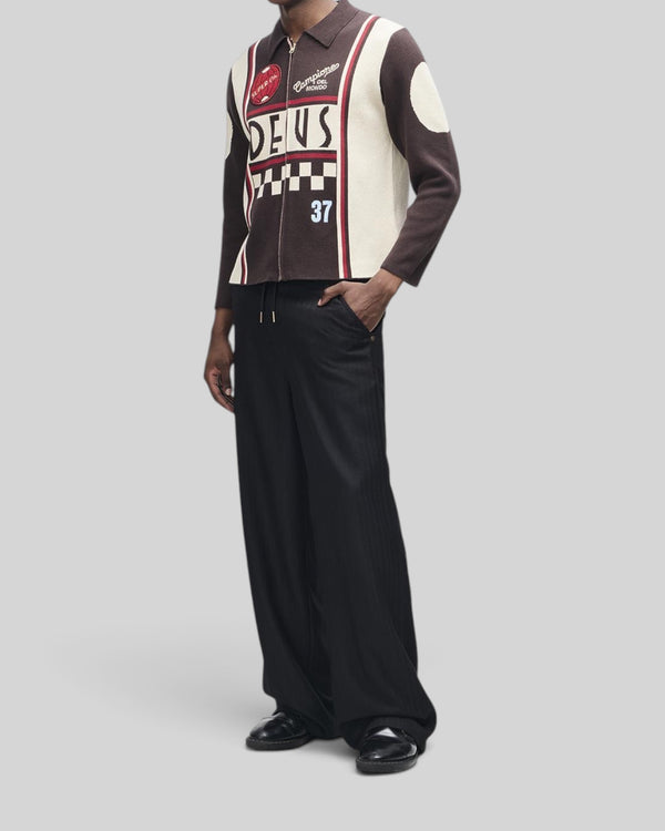 Baffle Haus Monte Carlo knit cardigan in java brown with moto-inspired graphic jacquard, zip front, and patches.