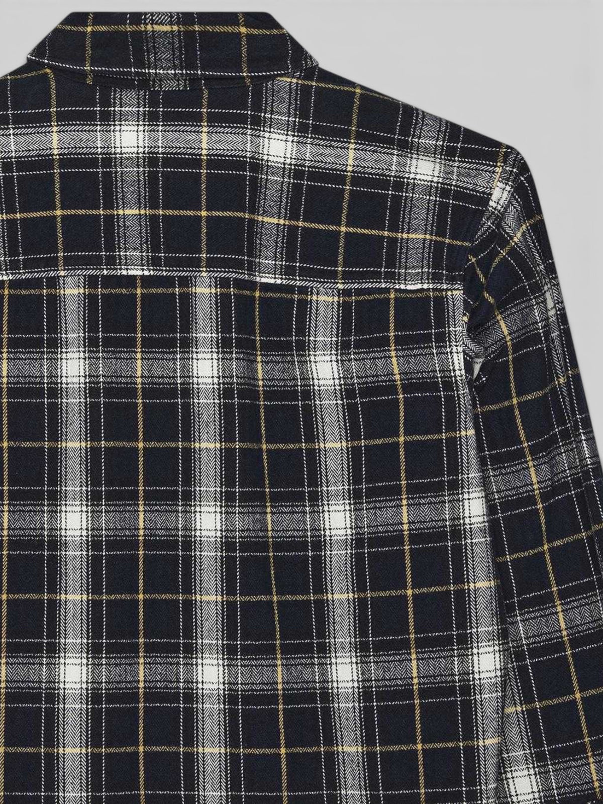 Close-up of the Baffle Haus Jermaine Check Shirt in blue, featuring a brushed cotton plaid pattern with white lines.