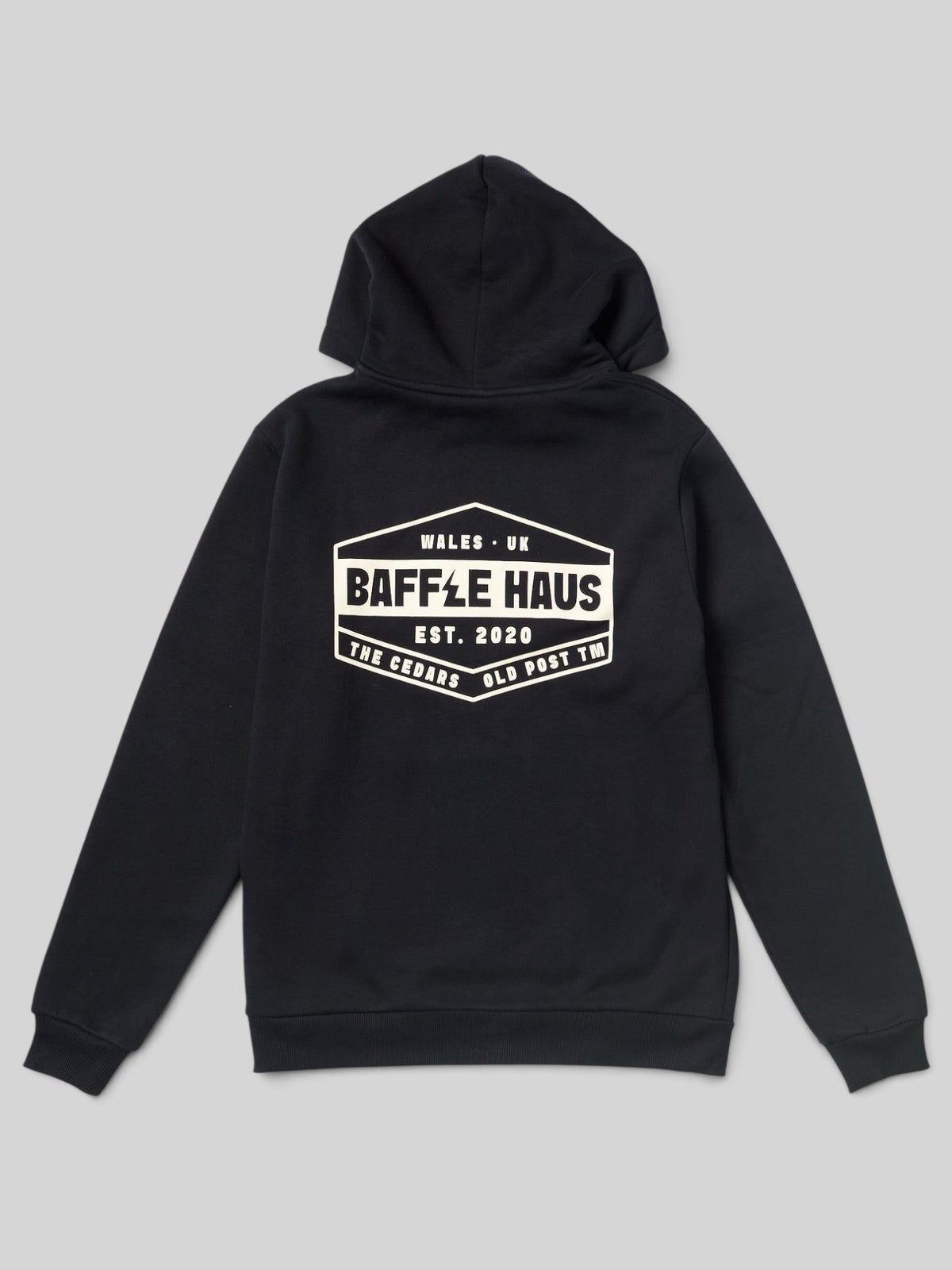 Back view of a Baffle Haus jet black heavyweight cotton blend hoodie featuring a white logo graphic on the back.