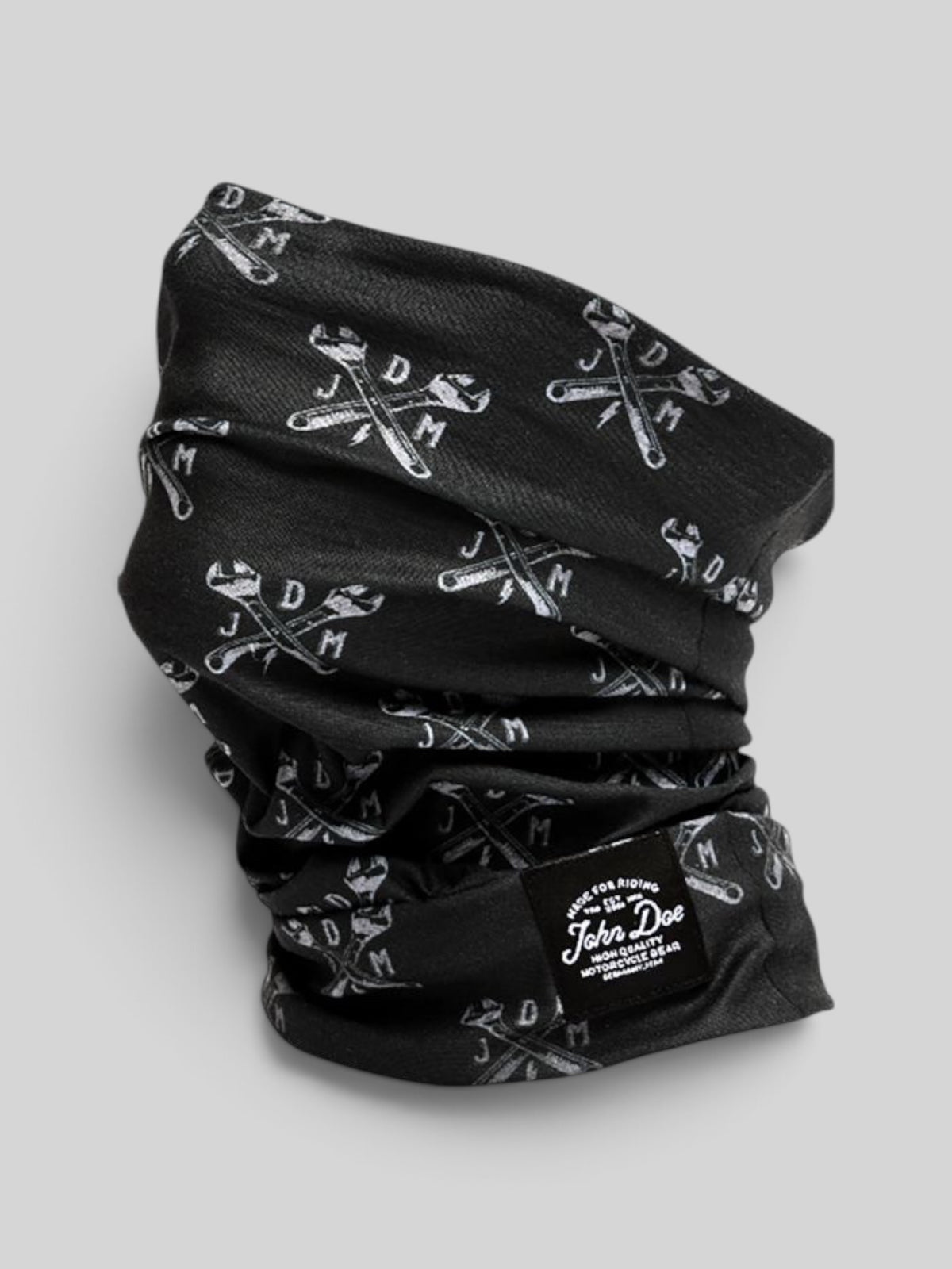 Baffle Haus John Doe black neck tube with white JDM wrench print made from breathable Coolmax microfiber