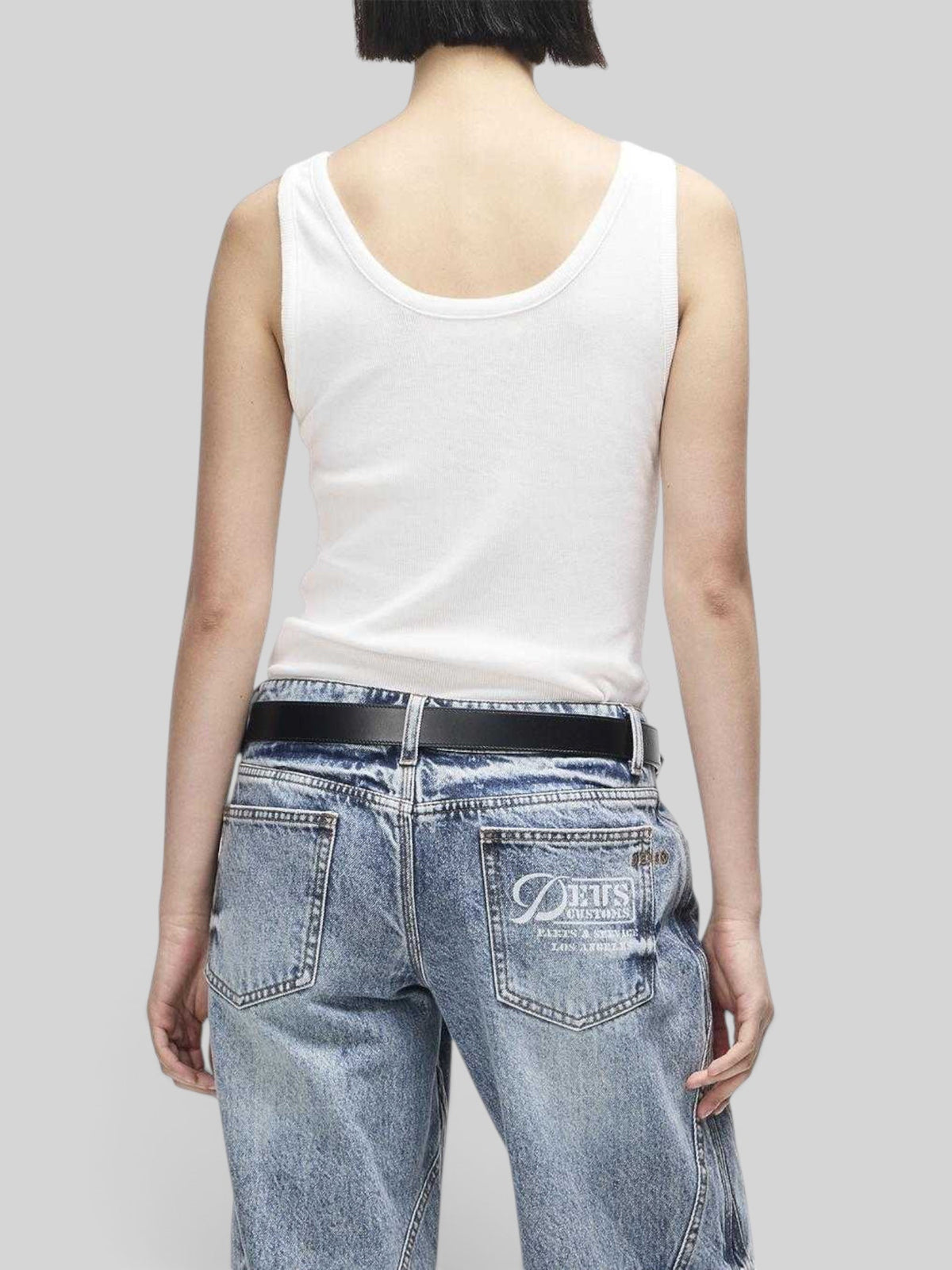 Baffle Haus June Shield Tank in vintage white, a slim fit ribbed tank top with thin straps, viewed from the back.