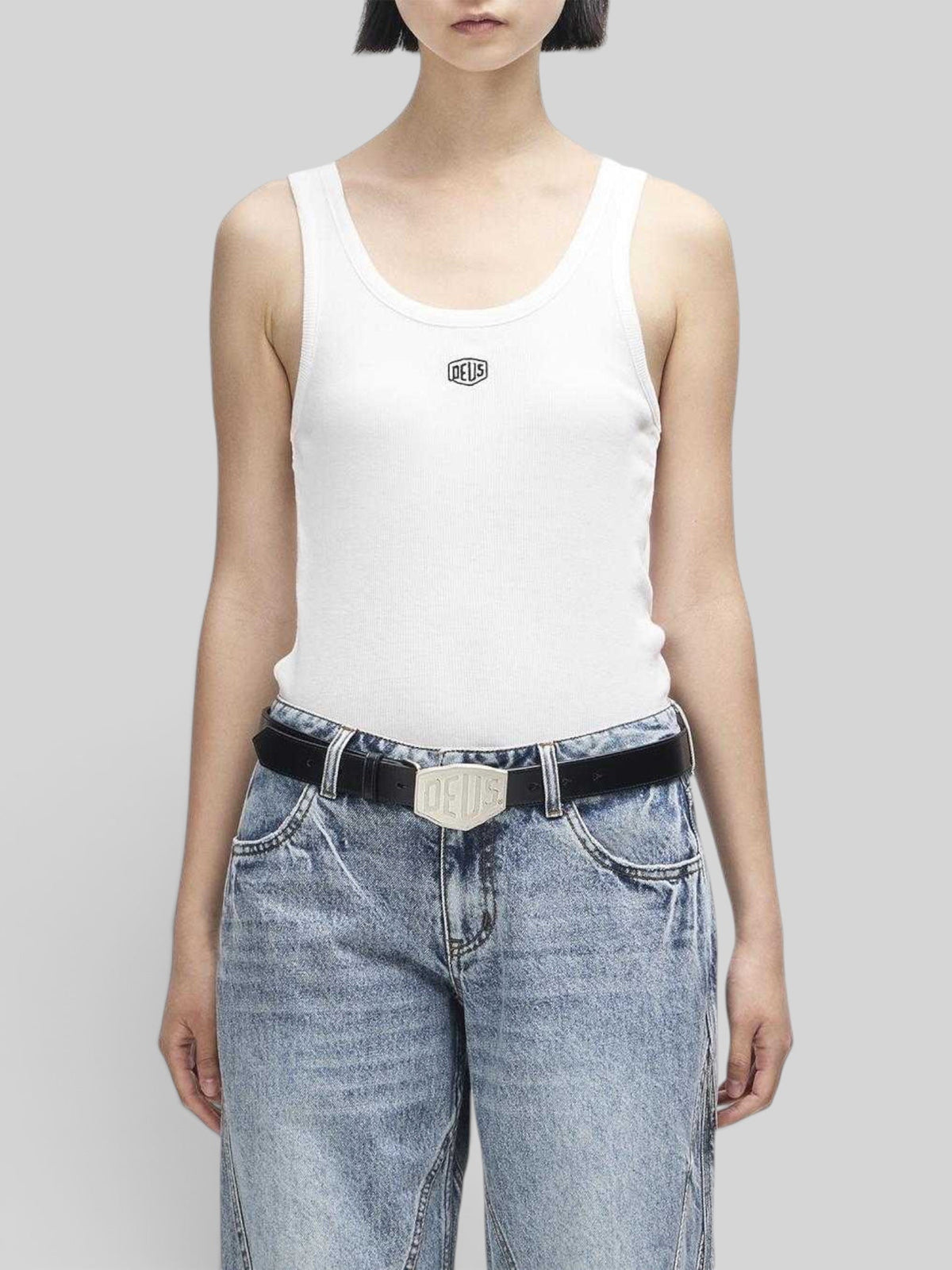Baffle Haus June Shield tank in vintage white with thin straps and centre chest embroidery worn with blue jeans