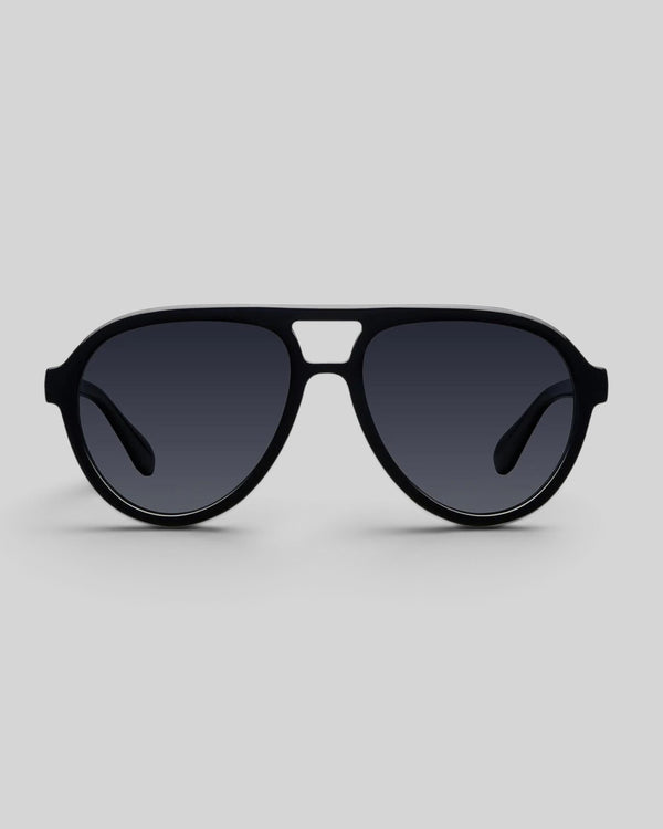 Baffle Haus KENA black aviator sunglasses with a double bridge and polarized lenses on a neutral background.