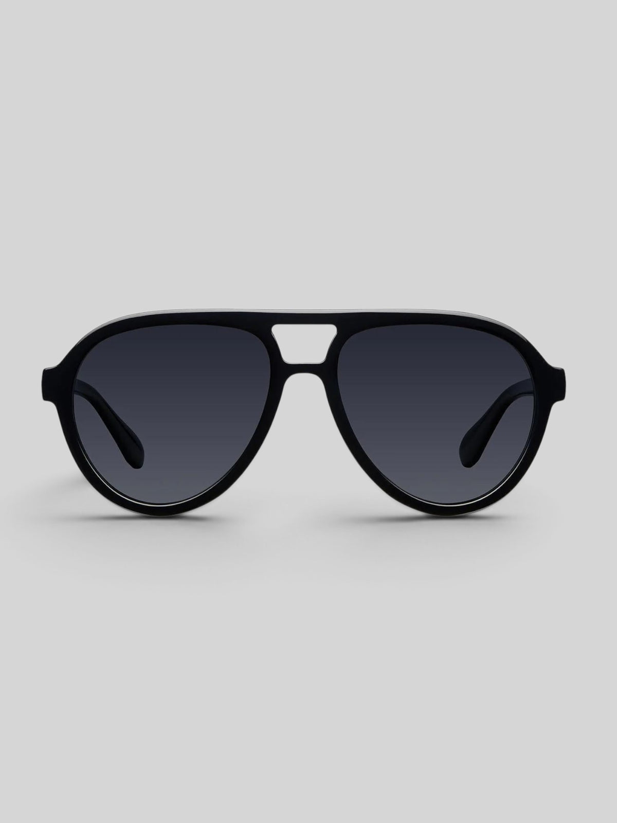 Baffle Haus KENA black aviator sunglasses with a double bridge and polarized lenses on a neutral background.
